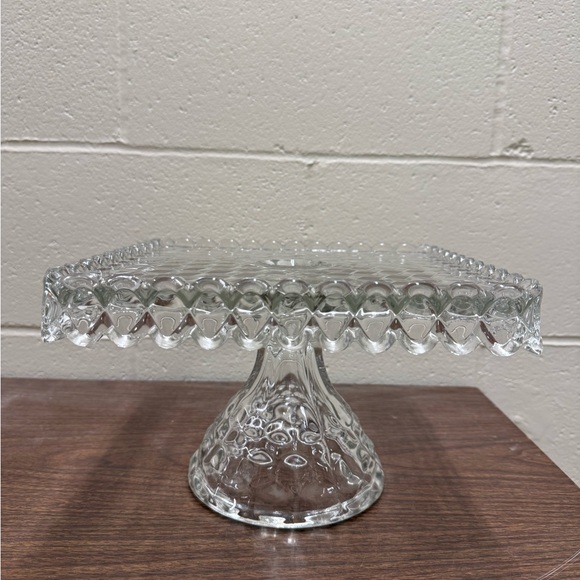 Vintage Fostoria American square cake stand with rum well.